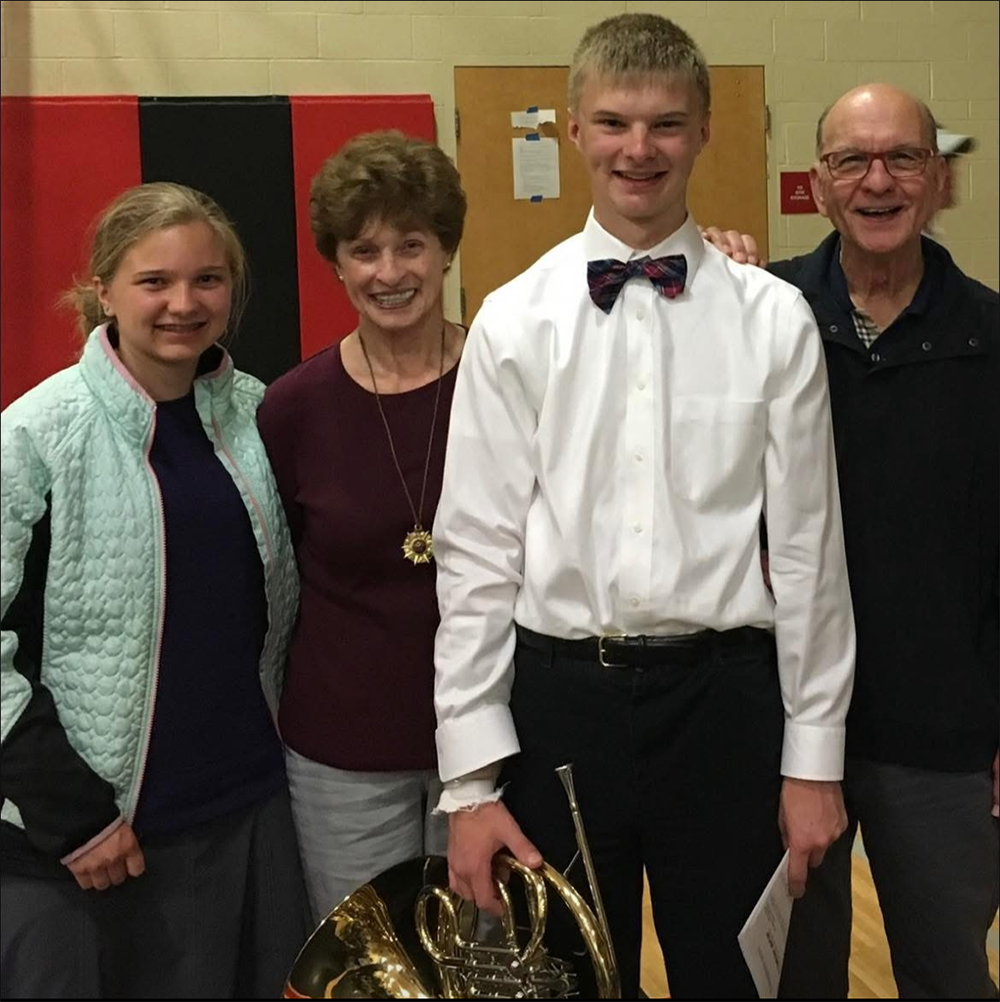 Nate and Hannah pose with their grandparents, Bob and Jane Braukus.
