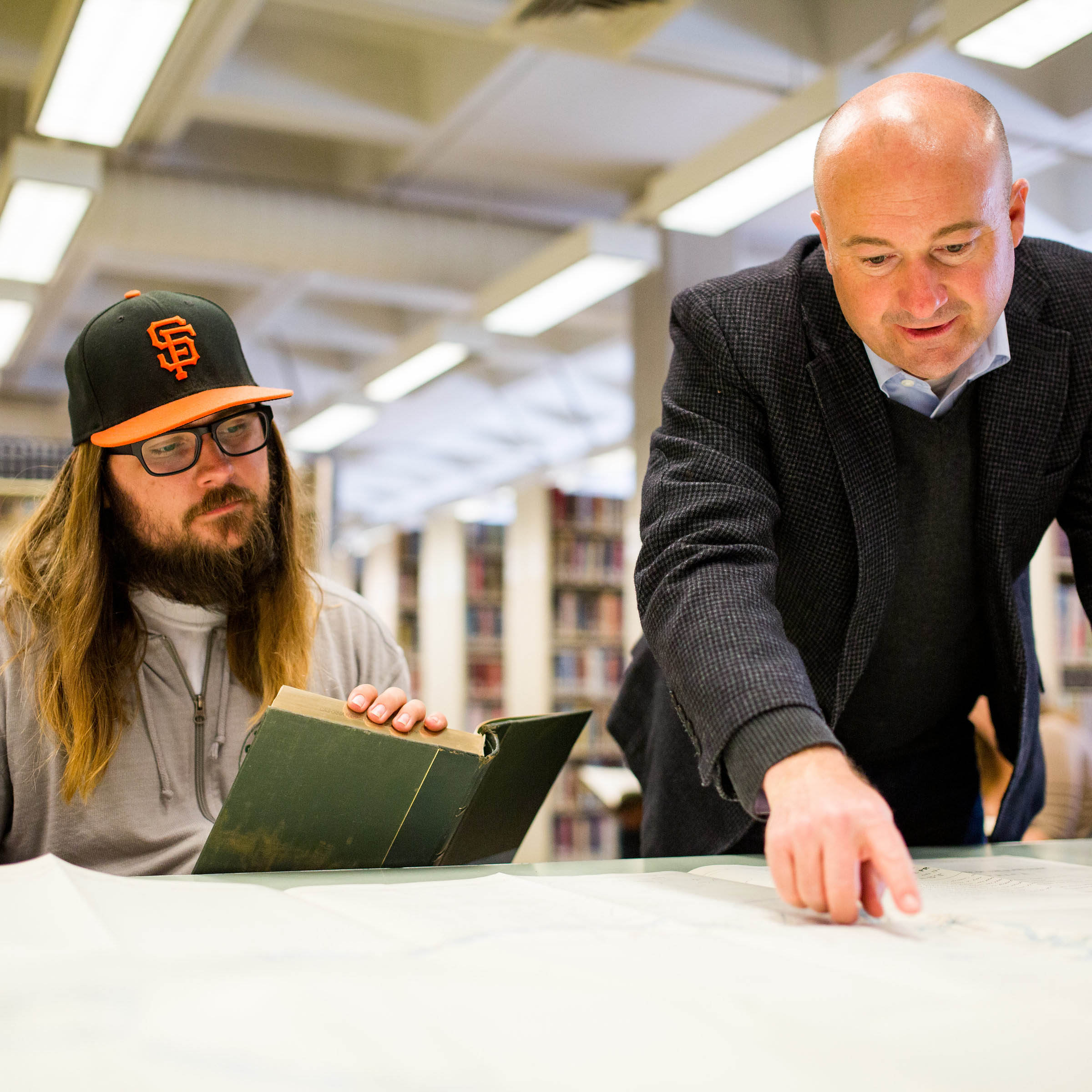 Cal Poly CLA Circle of Giving faculty recipient Mathew Hopper with student