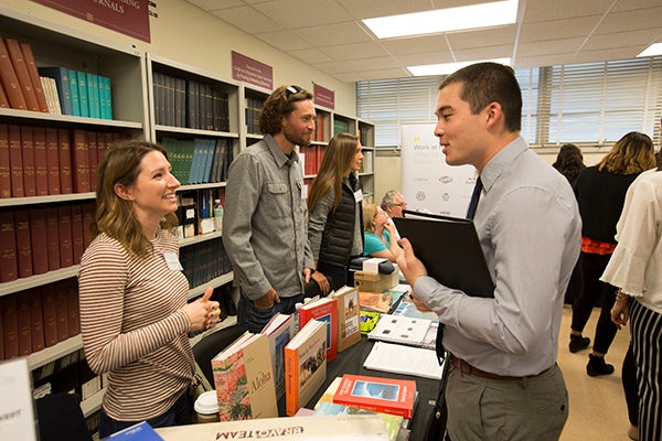 Jodran Damron chats with student