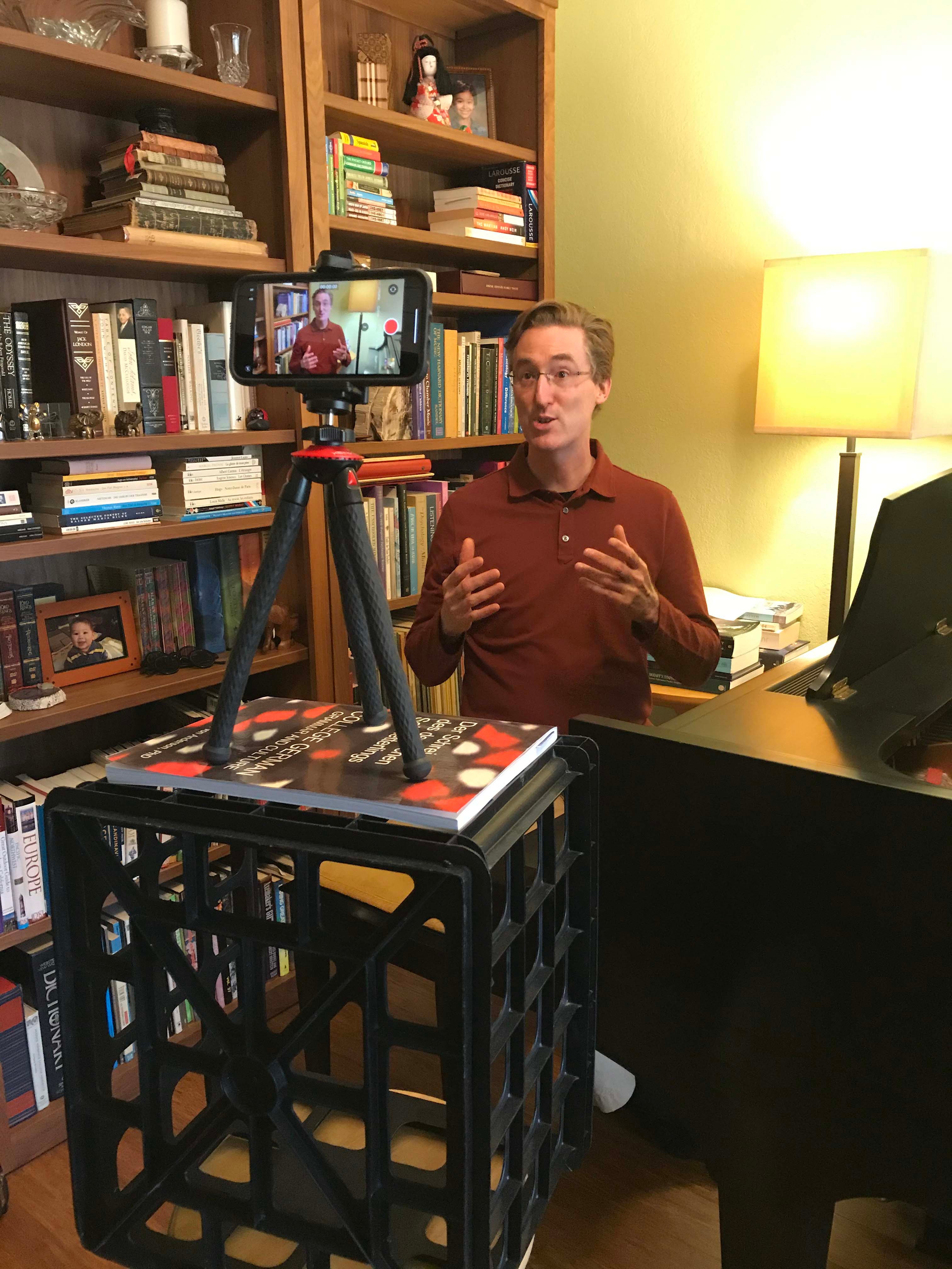 Music Professor David Arrivée making video podcasts for his History of the Symphony course last spring.