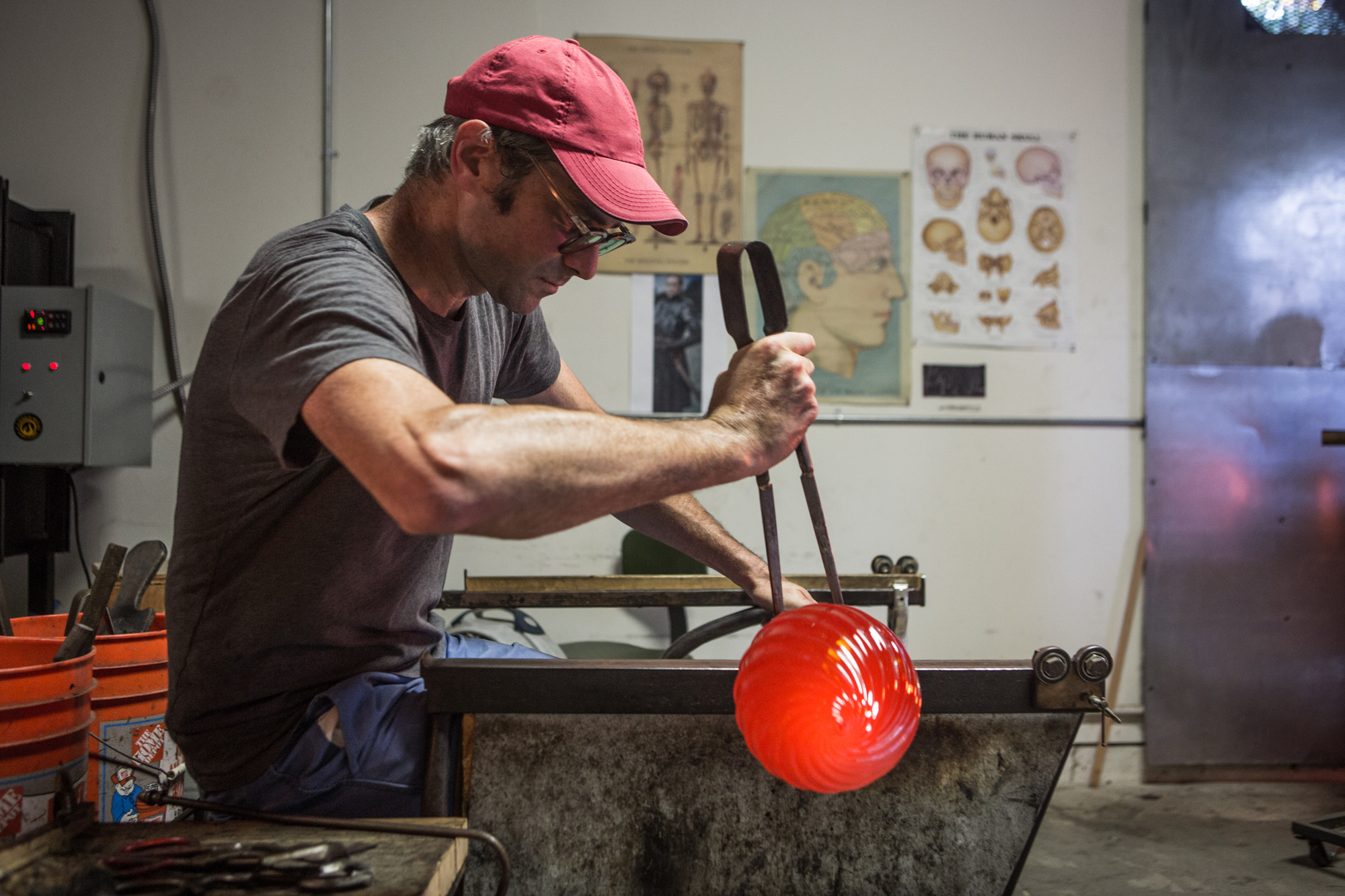Andy Paiko working on a blown glass piece