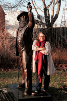 Catherine Waitinas in front of Walt Whitman statue