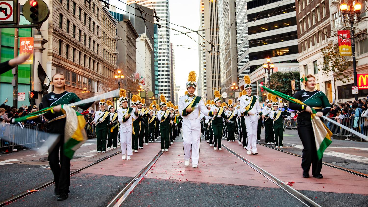 Example of an image that is floated to the right side The Cal Poly Colorguard and Mustang Band march through downtown San Francisco during the Chinese New Year Parade.