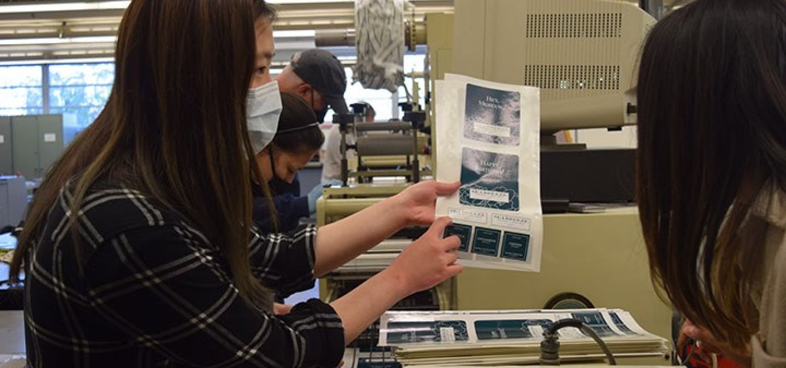 Graphic Communication student Mandy Ko works on specialty labels for the 2022 Phoenix Challenge.
