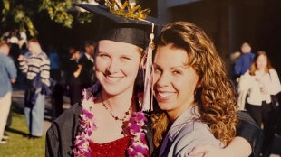 Samantha Schneider at commencement with her roommate Kelly Castro (Microbiology, '97)