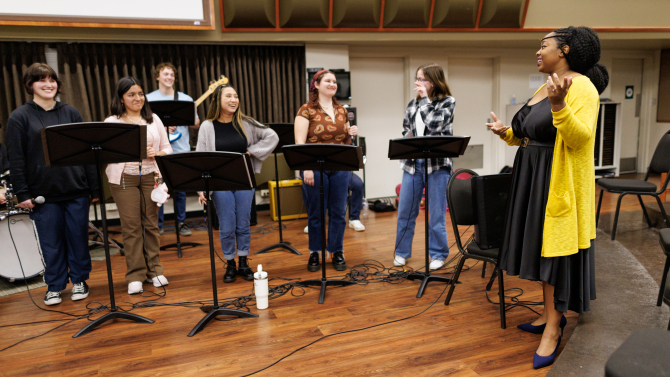 Students taking singing lessons