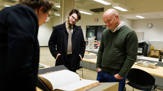 History professor Matthew S. Hopper’s HIST 504 - Graduate Study in History class gets a tour of the Kennedy Library’s Archives and Special Collections with Laura Sorvetti.