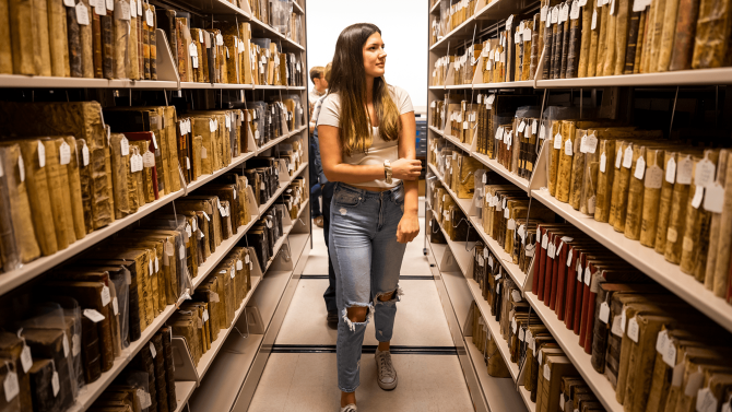 History Lecturer Cameron Jones visits the Santa Barbara Mission Archive-Library with a group of students to do research for their History 337 - Colonial Latin American History class paper. Getting archival experience as part of a history class is helpful since it is a critical part of several history related careers such as historical researcher, librarian, archivist, genealogist, or historical preservationist.