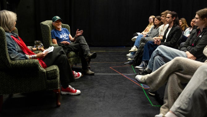 Actor Billy Bob Thorton sits with a group of people